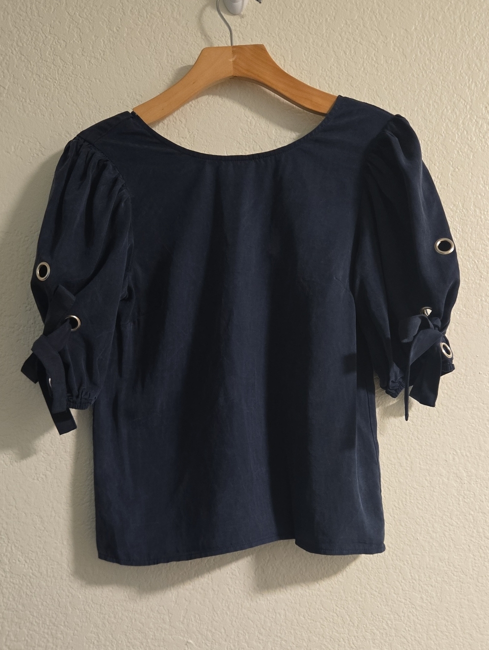 J.O.A. Navy Blue Puff Sleeve Blouse with Grommet Tie Details